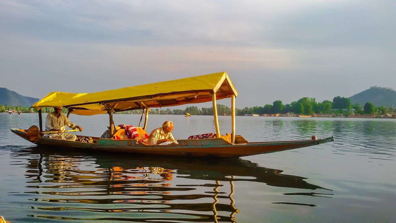 shikara ride in dal lake Kashmir soil travels